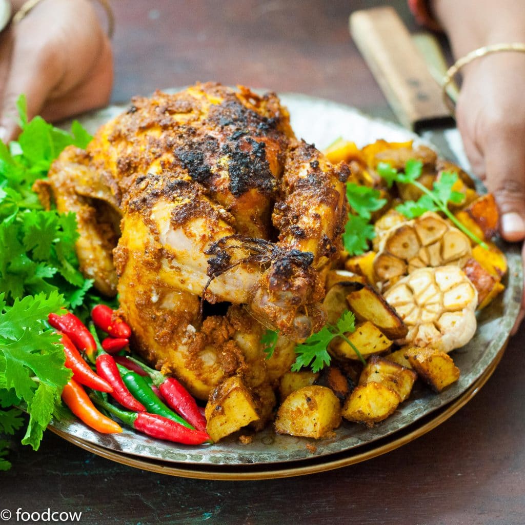 Easy Indian Style Chicken Roast Recipe - Whole Chicken & potatoes roasted with desi indian spices ,yogurt and Ghee.
