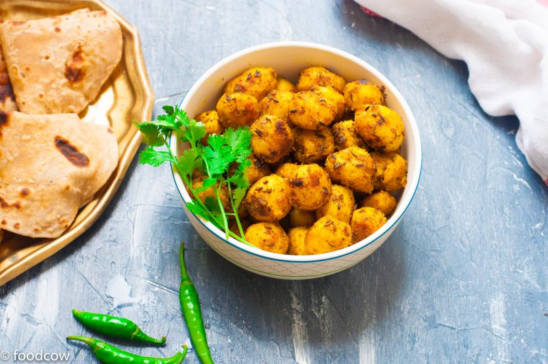 Masala Baby Potato Fry Recipe - Roasted New Potatoes in Indian Spices.Vegetarian Everyday Simple Sabzi best served with Dal and Rice/Roti