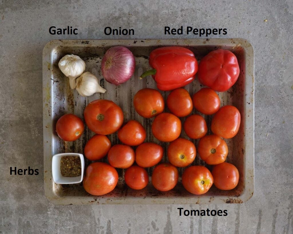 Ingredients to make the roasted tomato and red pepper pasta sauce
Fresh tomaotes
Garlic
Onion
Red Peppers
Dried herbs