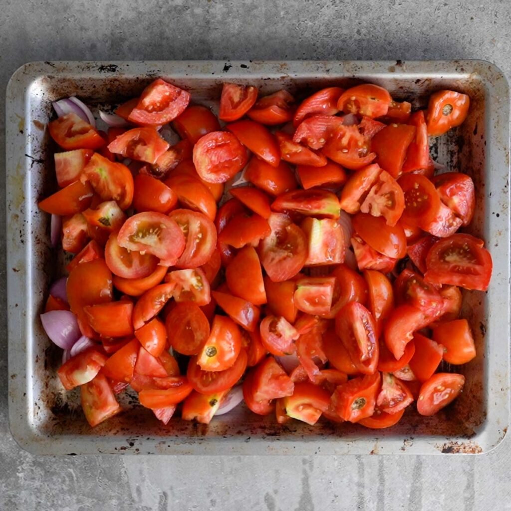 chopped tomatoes in a baking tray