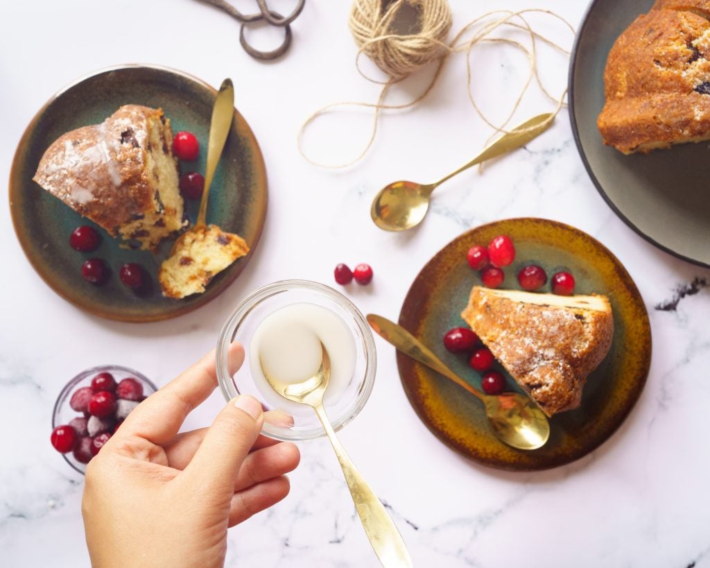 Lemon Cranberry Cake  slices with fresh cranberries