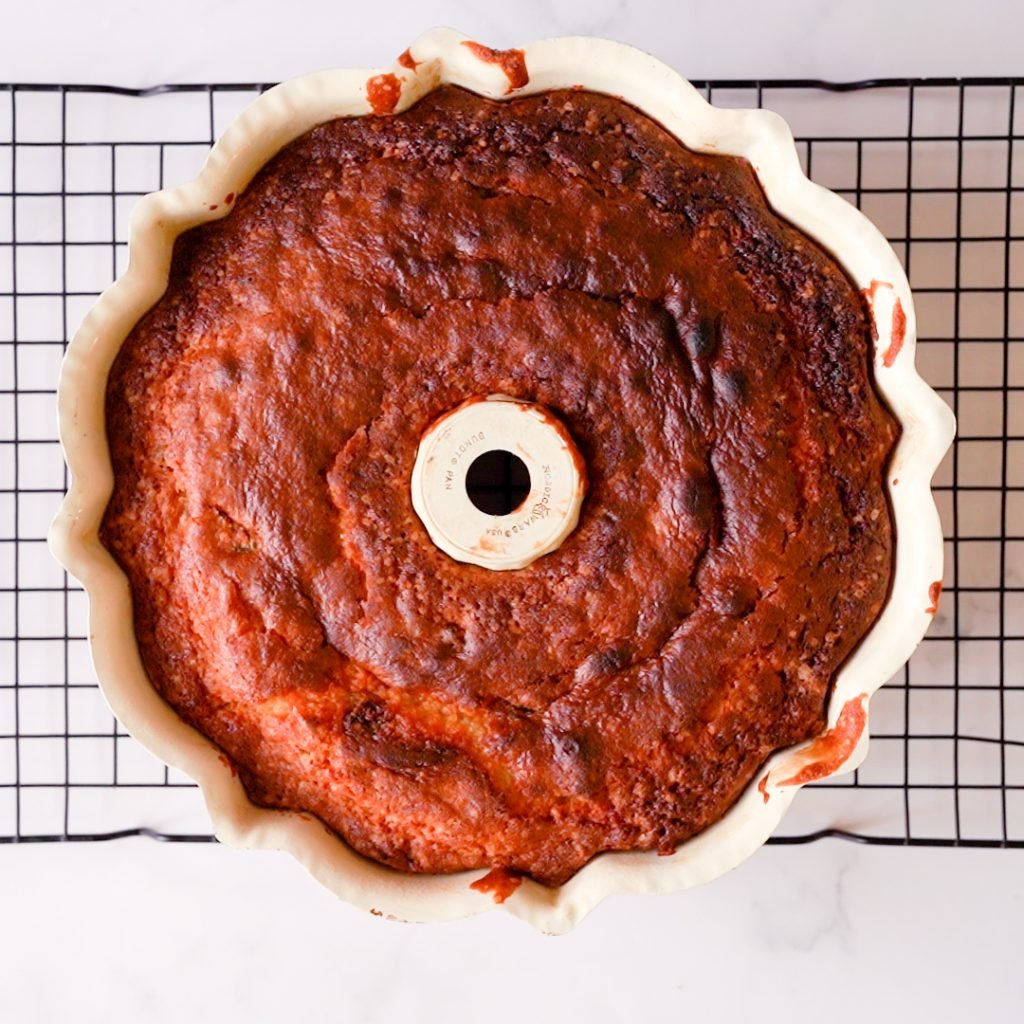 Cooked lemon Cranberry cake in a 10 inch bundt pan