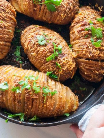 Baked Parmesan Hasselback Potatoes with herbs and garlic