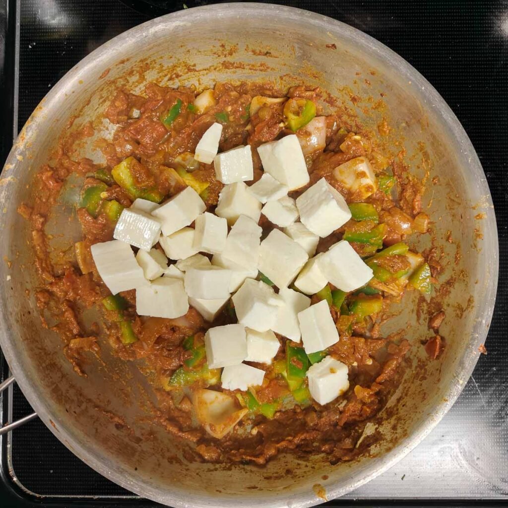 paneer in a pan with bhuna masala