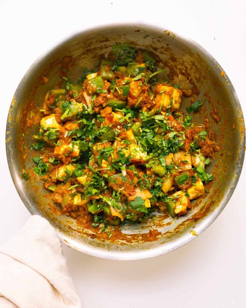 Paneer capsicum sabzi in a pan