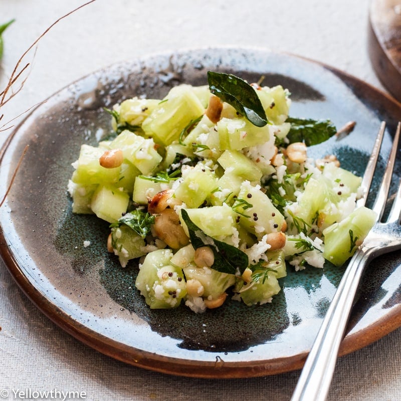 Indian Cucumber and Coconut Salad - Healthy Khamang Kakdi Salad recipe with diced cucumber tossed in fresh coconut,curry leaves and roasted peanuts