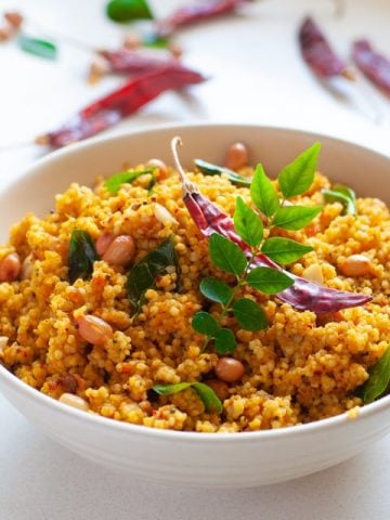 Tamarind Rice with Foxtail Millet - A delicious and easy to make ,healthier Puliyodhrai recipe using millets instead of rice. #millets #foxtailmillet #healthy #healthyeating #southindian #puliohare #tamarind #tamarindrice #milletrecipe #indianrecipe #milletrecipe