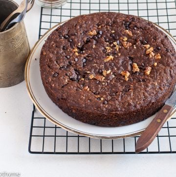 Healthy Ragi Banana Cake with Chocolate Chips and Walnuts - Eggless and Gluten Free Cake made with un refined Sugar ,Oats and Finger Millet.
