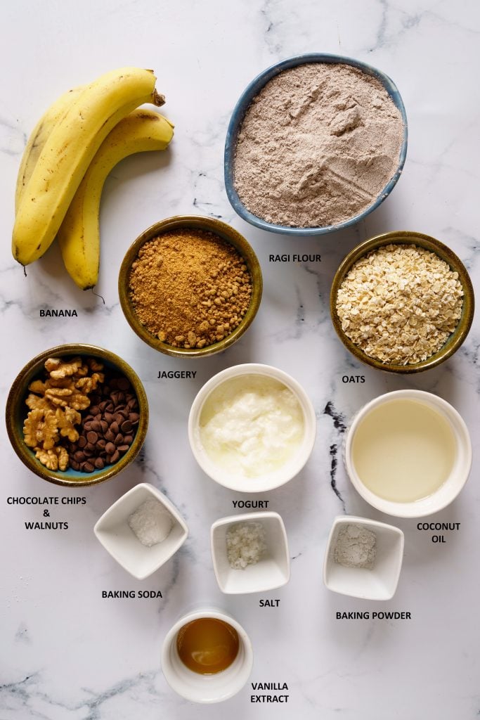 Ingredients for Making Ragi cake- Bananas, Ragi flour, Oats,JAggery,Walnits,Chocolate chips,Coconut oil,Yogurt,Salt,Baking powder,Baking Soda,Vanilla extract