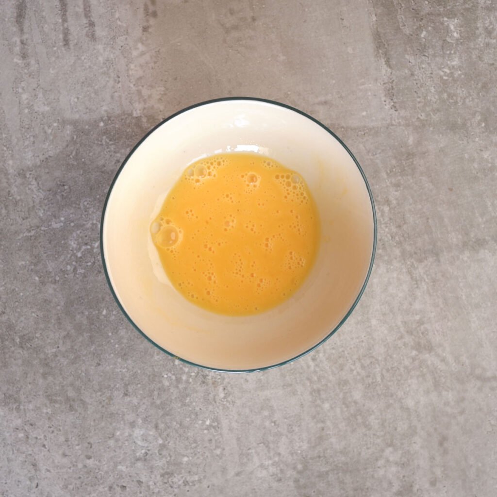 whisked egg in a bowl