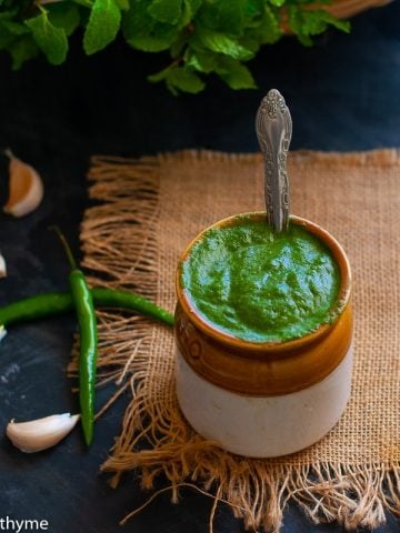 Indian Green Chutney Recipe with Coriander and Mint leaves.This Chutney is Vegan,Paleo and whole 30 approved and Gluten Free. #chutney #greenchutney #corianderchutney #mintchutney
