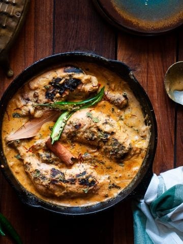 Mughlai Saffron Chicken Chaap Recipe – Whole Chicken leg pieces cooked in a rich gravy with cashew, poppy seeds and saffron #chicken #indianchicken #mughlai #saffron #chickenroast #indianchickenrecipe