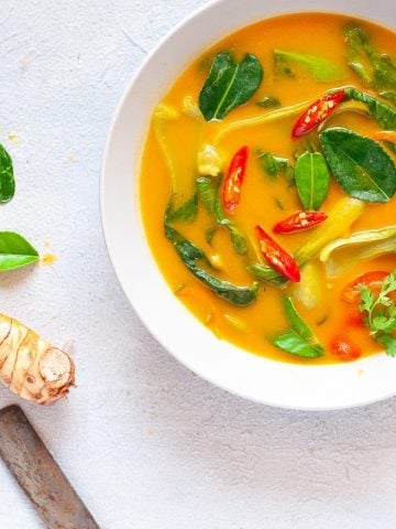 Healthy Thai Pumpkin Soup made with Thai Red Curry Paste and Coconut Milk.A perfect whole 30 approved,Paleo,Gluten Free Dinner