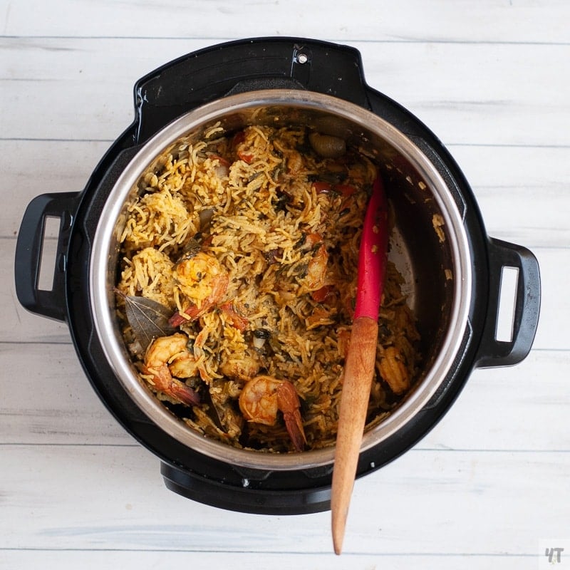 Easy shrimp pulao Recipe made with Indian whole spices, Coconut Milk and coriander and mint leaves with both Instant Pot and Stove Top methods