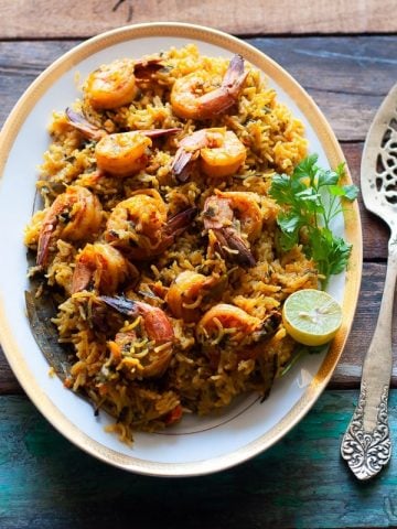 Easy Prawn Pulav Recipe made with Indian whole spices, Coconut Milk and coriander and mint leaves with both Instant Pot and Stove Top methods