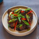 Easy Filipino Adobo Chicken - Chicken in a sweet and spicy glossy sticky sauce made with soy sauce, vinegar and brown sugar. #chicken #adobochicken #filipino