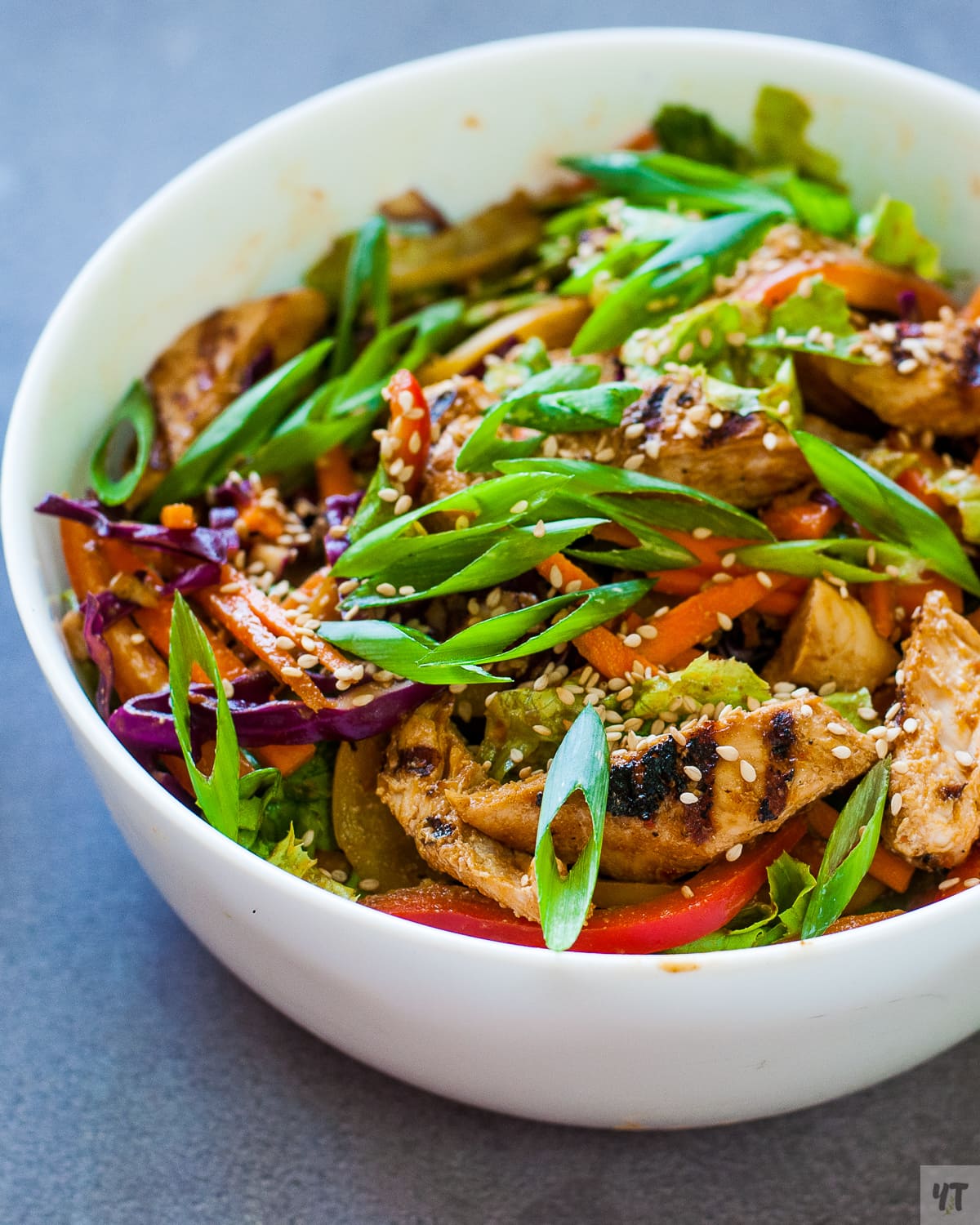 Asian Grilled Chicken Salad in Peanut butter & Chilli Dressing - Low calorie, dairy free,Gluten Free Salad recipe with an asian inspired dressing. #salad #asiansalad #chicken #chickensalad #peanutbuttterdressing #peanutbutter #chickentenders