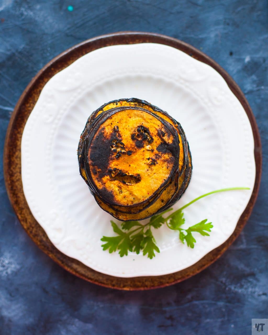 Healthy Baigan Bhaja - Smoky Eggplant Roasted in very little oil and charred over the fire for a smoky taste. Low Carb, Vegan & Paleo recipe. #eggplant #indian #paleo #whole30 #vegan #smoky #baigan #bhaja #roastedeggplant #vegetarian #lowcarb