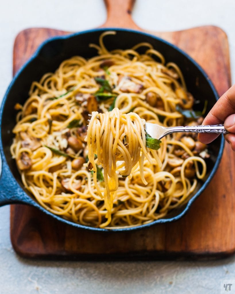 Pasta in Mushroom Butter Garlic Sauce - Easy Weeknight Pasta dinner made with Butter, Olive Oil, garlic, herbs , pasta and parmesan Cheese.