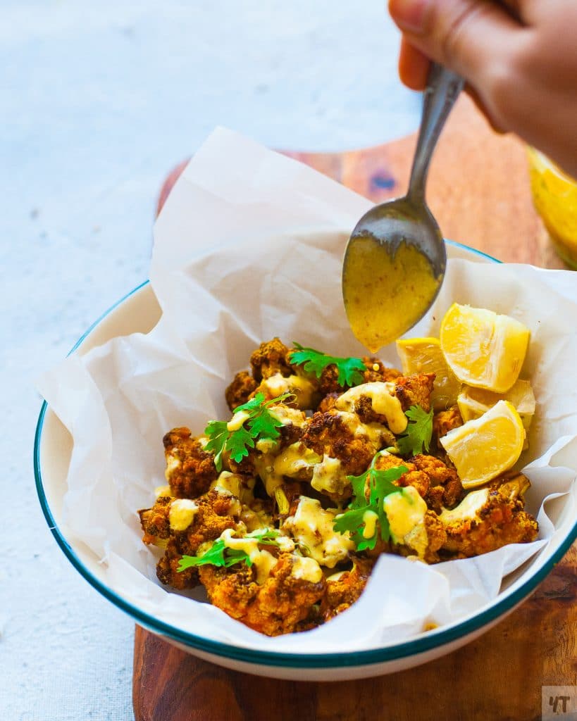 Air Fryer Curry Cauliflower - Super Crispy, spicy cauliflower fried in airfryer with only 1 tsp of oil.Super low carb Vegan Recipe. #cauliflower #lowcarb #vegan #paleo #whole30 #airfryer