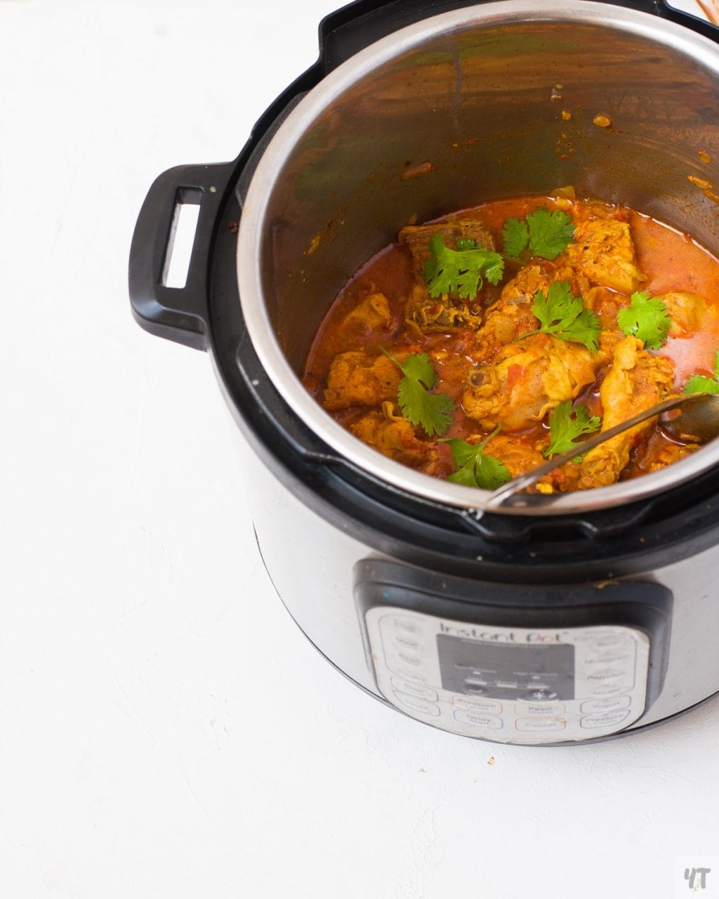 Instant Pot Indian Chicken Curry - Quick & Easy Desi Chicken Curry recipe made with bone in chicken, yogurt and spices under 30 minutes. #chickencurry #indian #instantpot #curry #easy #quick #indianfood #indianrecipe #recipe #instantpotindianrecipe
