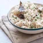 How to make Jeera Rice in Instant Pot without soaking.Perfectly made Indian cumin spiced rice recipe which goes with any curry! #rice #indianrecipe #instantpotrecipe #indianricerecipe #jeerarice #cuminrice #gheerice