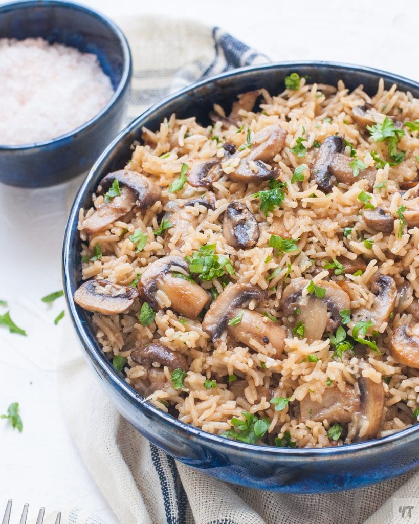 Mushroom Parmesan Rice- Buttery Cheesy Parmesan rice with caramalised mushrooms,garlic and parsley made in pressure cooker within 30 minutes. #mushroom #instantpot #parmesanrice #rice #mushroomrice #recipe #vegetarian #pressurecookerrice