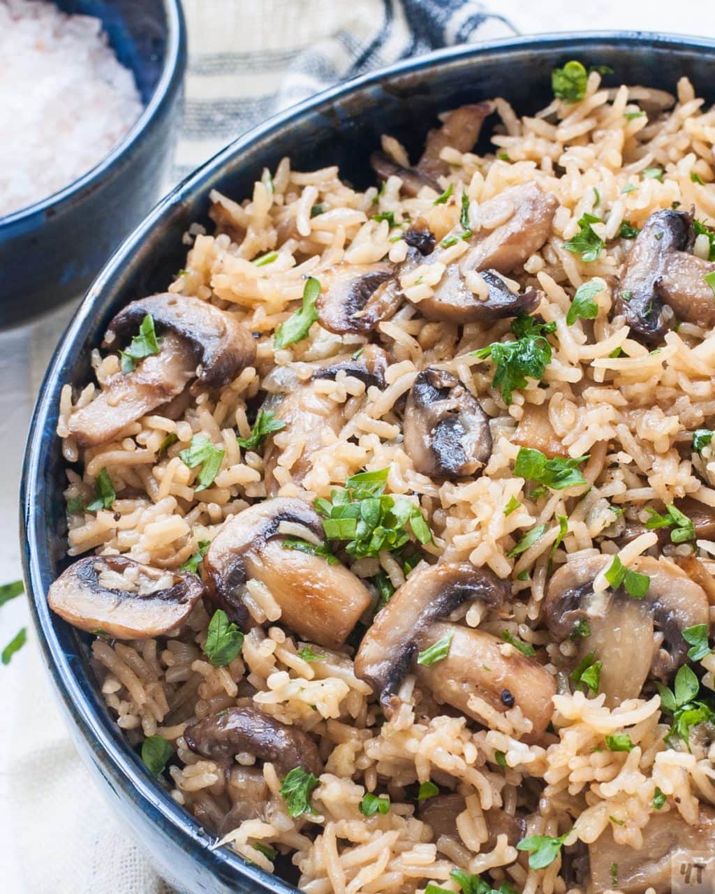 Mushroom Parmesan Rice- Buttery Cheesy Parmesan rice with caramalised mushrooms,garlic and parsley made in pressure cooker within 30 minutes. #mushroom #instantpot #parmesanrice #rice #mushroomrice #recipe #vegetarian #pressurecookerrice