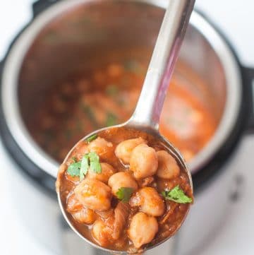 Instant Pot Chana Masala recipe - Indian Spiced Curry made with Dried Chickpeas or Garbanzo Beans. Vegan, Meal prep freindly Punjabi Chole Masala Recipe. #chole #chickpeas #garbanzobeans #instantpot #pressurecooked #indian #indianrecipe #recipe #vegan #glutenfree