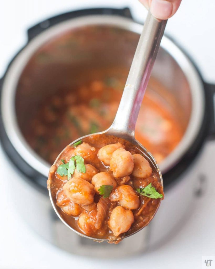 Instant Pot Chana Masala recipe - Indian Spiced Curry made with Dried Chickpeas or Garbanzo Beans. Vegan, Meal prep freindly Punjabi Chole Masala Recipe. #chole #chickpeas #garbanzobeans #instantpot #pressurecooked #indian #indianrecipe #recipe #vegan #glutenfree