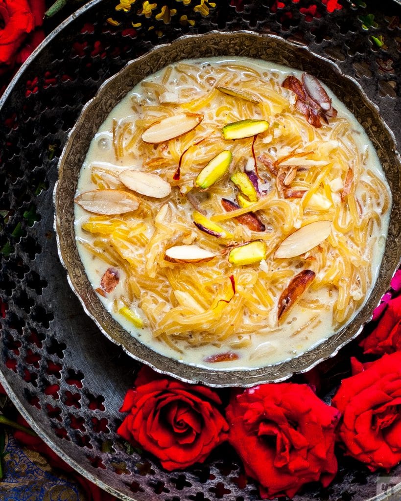 Instant Pot Vermicelli Kheer - Semiya Payasam or Sev ki Kheer in a silver bowl with pistachios, almonds and saffron as garnish.