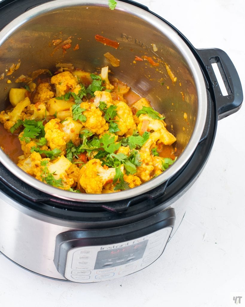 Aloo Gobi in instant pot Close up.Potatoes and cauliflower in instant pot.