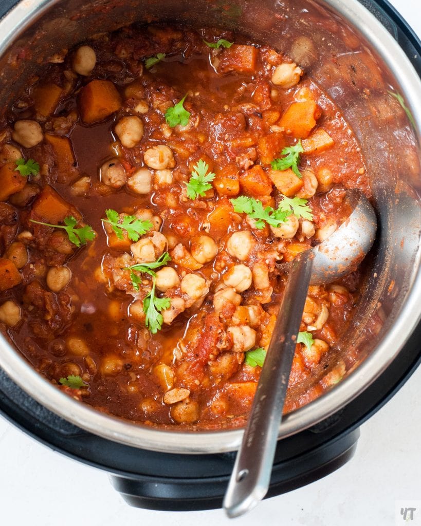 Instant Pot Moroccan Chickpea Stew with a ladle