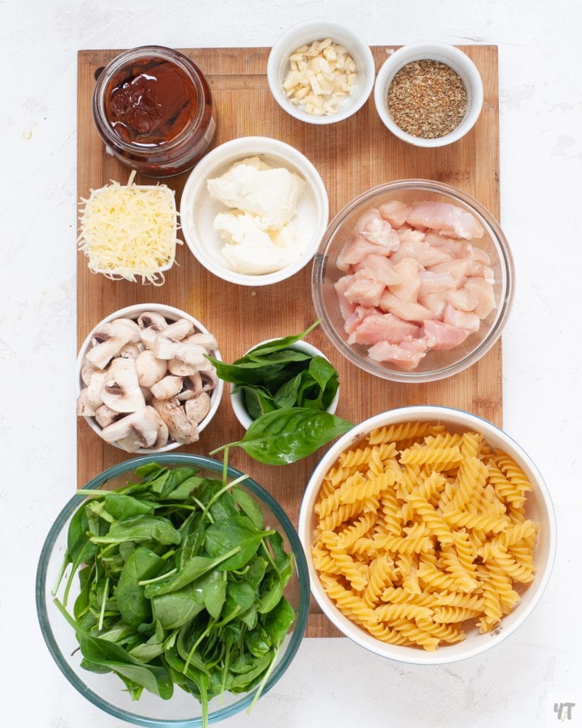 Ingredients for Instant Pot Tuscan Chicken Pasta-Instant Pot Tuscan Chicken Pasta - Rotini pasta, boneless chicken breast, Sundried Tomatoes, Spinach, Cream Cheese and Parmesan cheese , seasoning