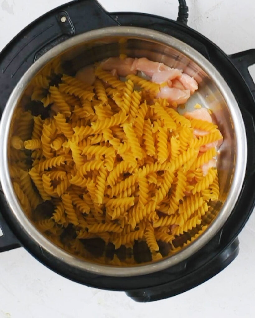 Layer 2 : pasta over the chicken in the instant pot