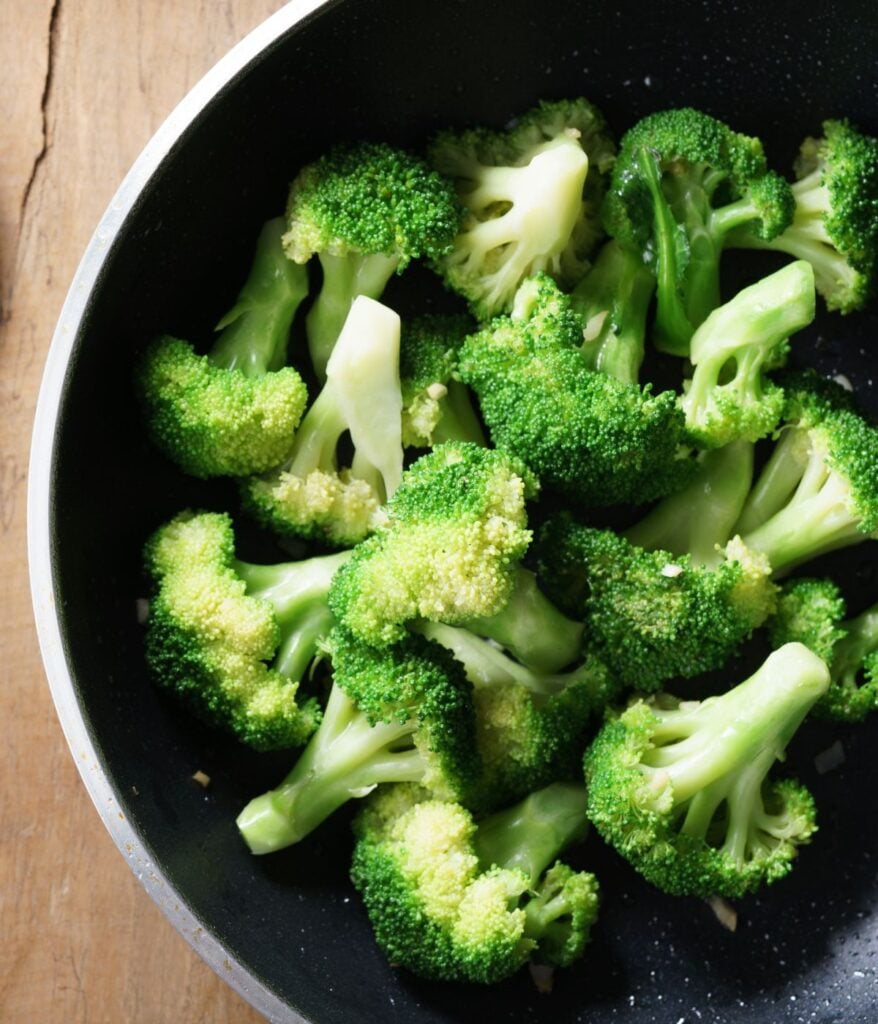 Steamed Broccoli in a black bowl