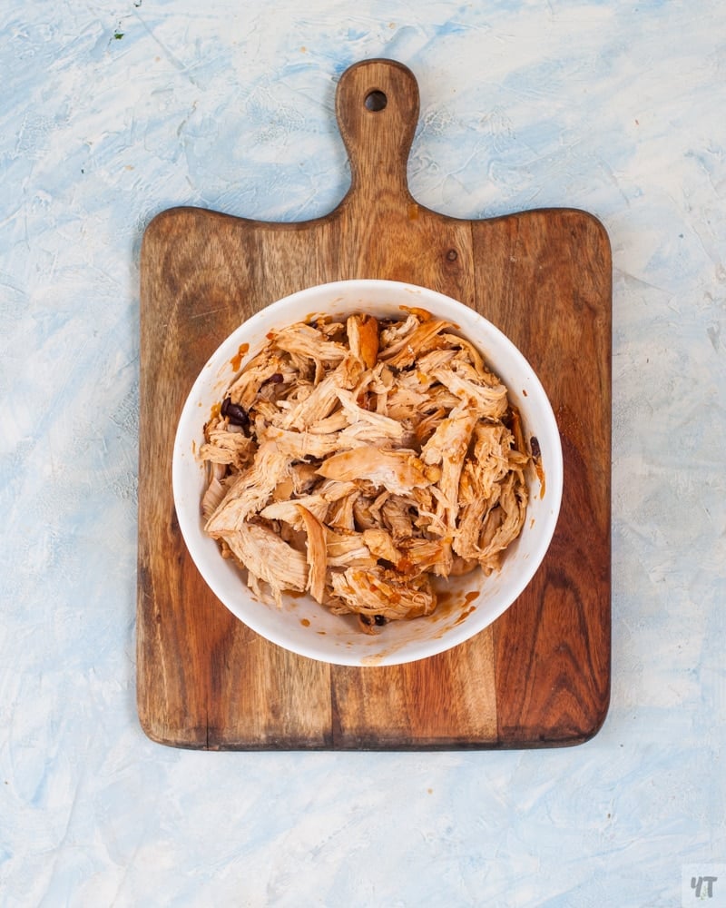 instant pot Shredded Chicken in a white bowl