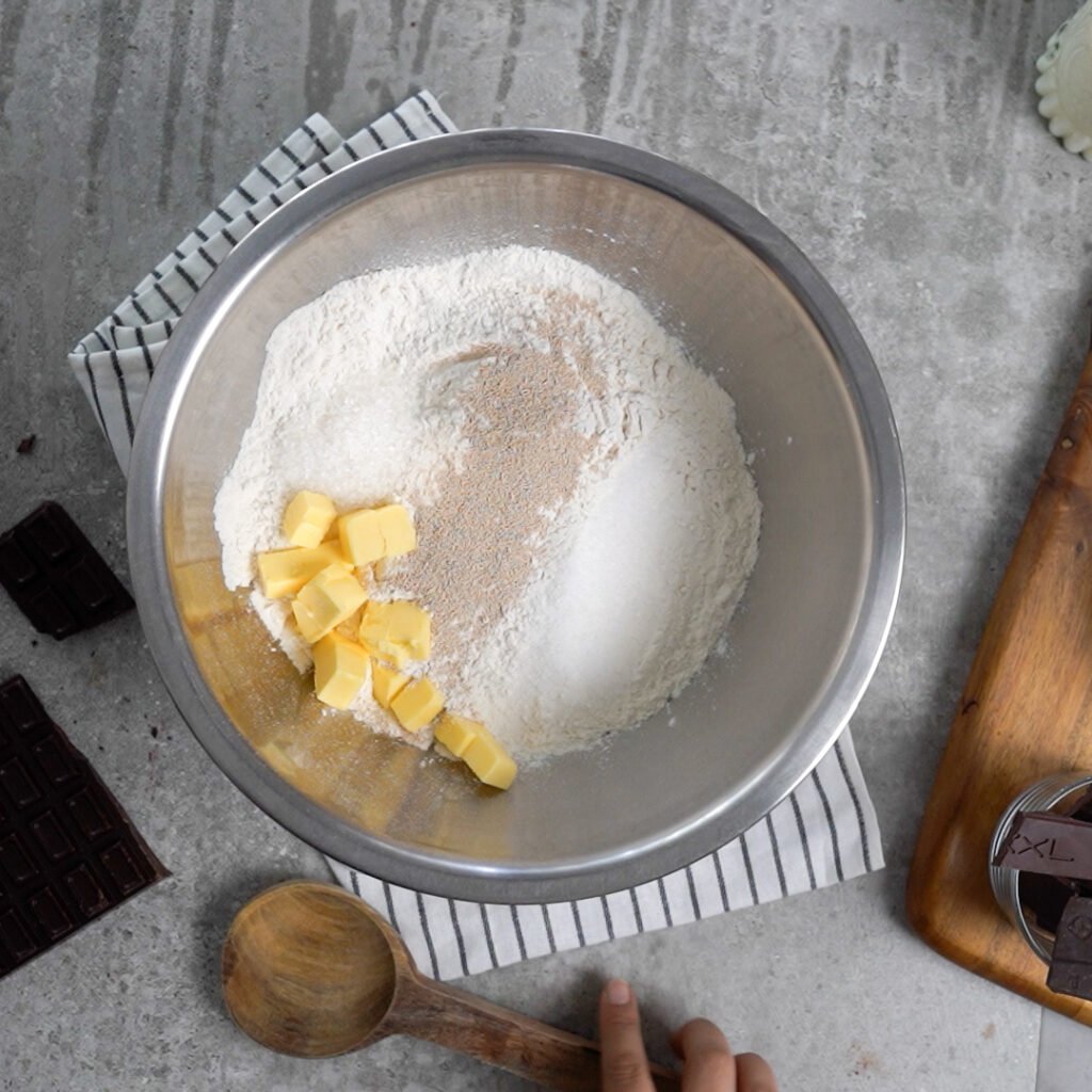 Flour, Yeast & Butter in a large bowl