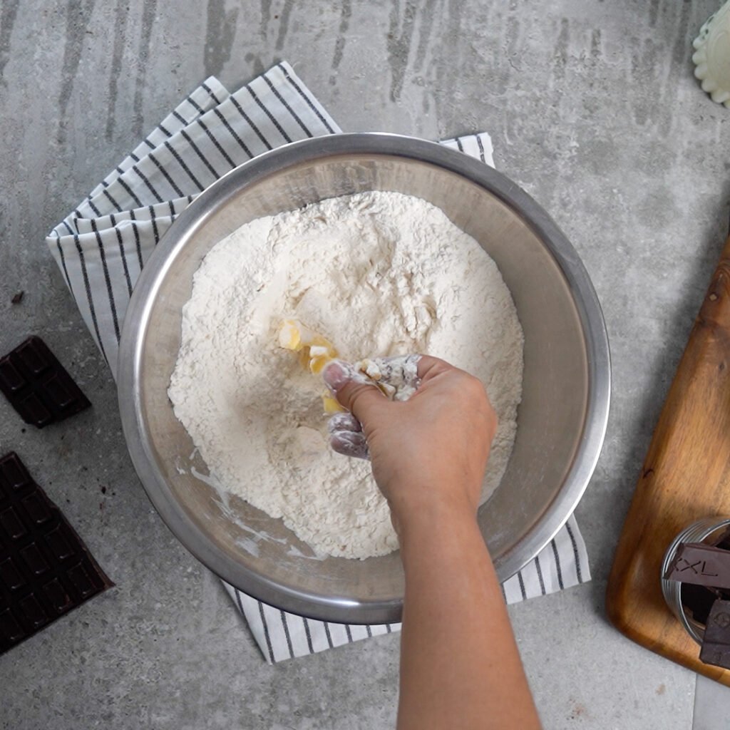 Mix and Rub the butter into the flour to make chocolate babka dough