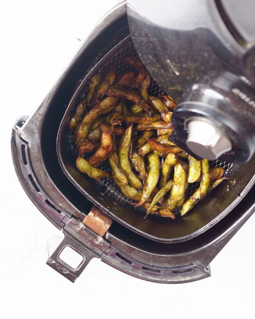 Air fryer Whole Edamame in the air fryer basket