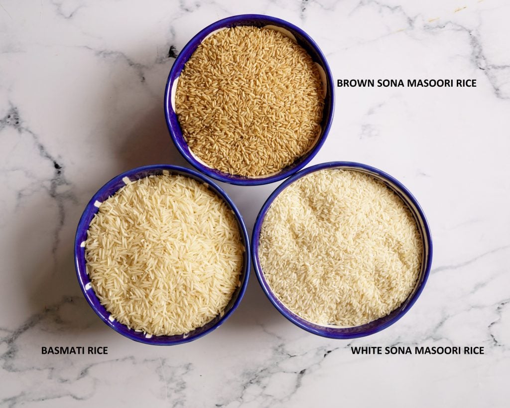 3 bowls with white sona masoori rice, brown sona masoori rice & Basmati Rice