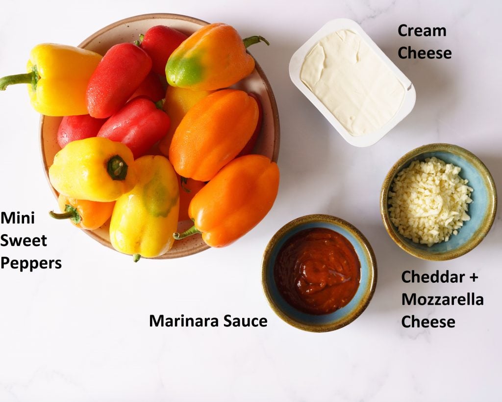 Ingredients for making Air Fryer Mini Peppers - mini bell peppers, cream cheese, marinara sauce and cheese