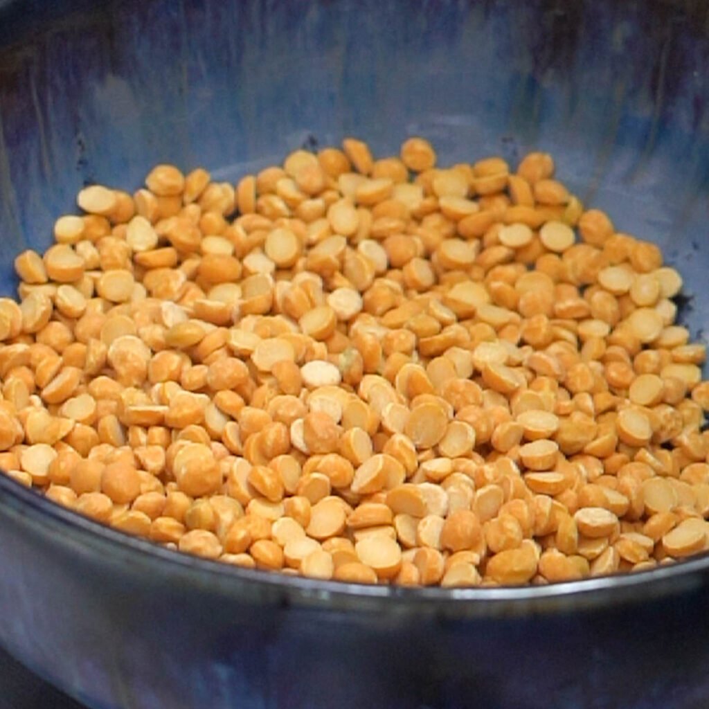 Chana Dal being washed before cooking