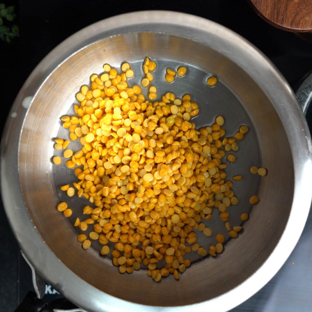 Washed Soaked Chana Dal inside a pressure cooker