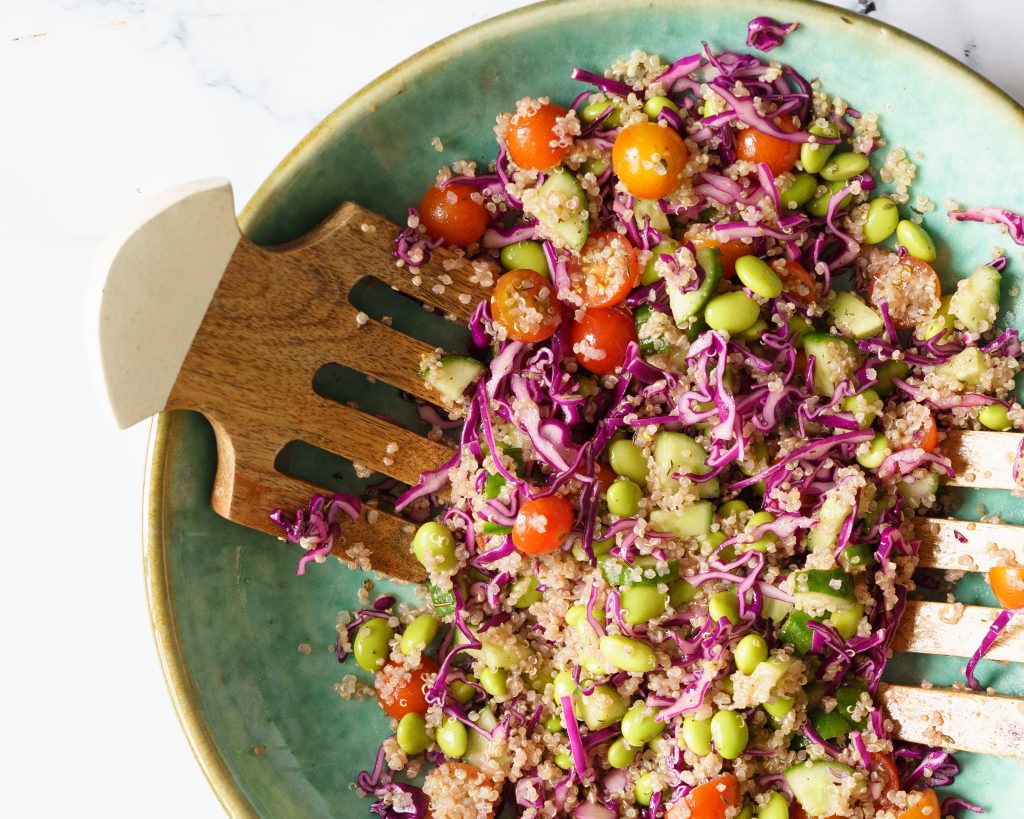 Edamame Quinoa salad with  cucumber,tomatoes and purple cabbage.