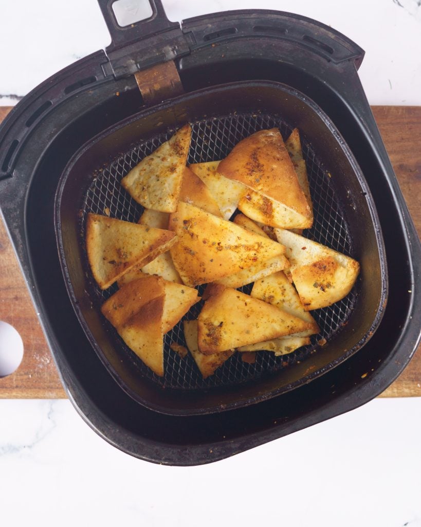 Air Fryer pita chips in the air fryer basket