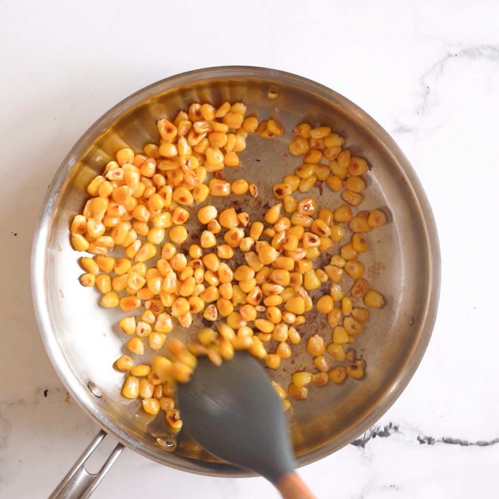 Pan frying shucked corn or sweet corn.