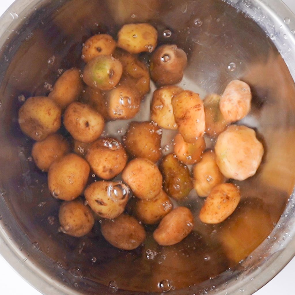 washing and boiling the potatoes