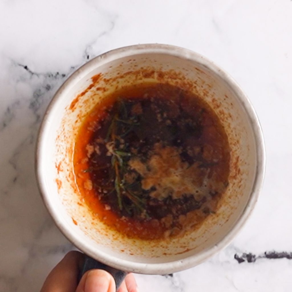 Making the garlic rosemary butter seasoning