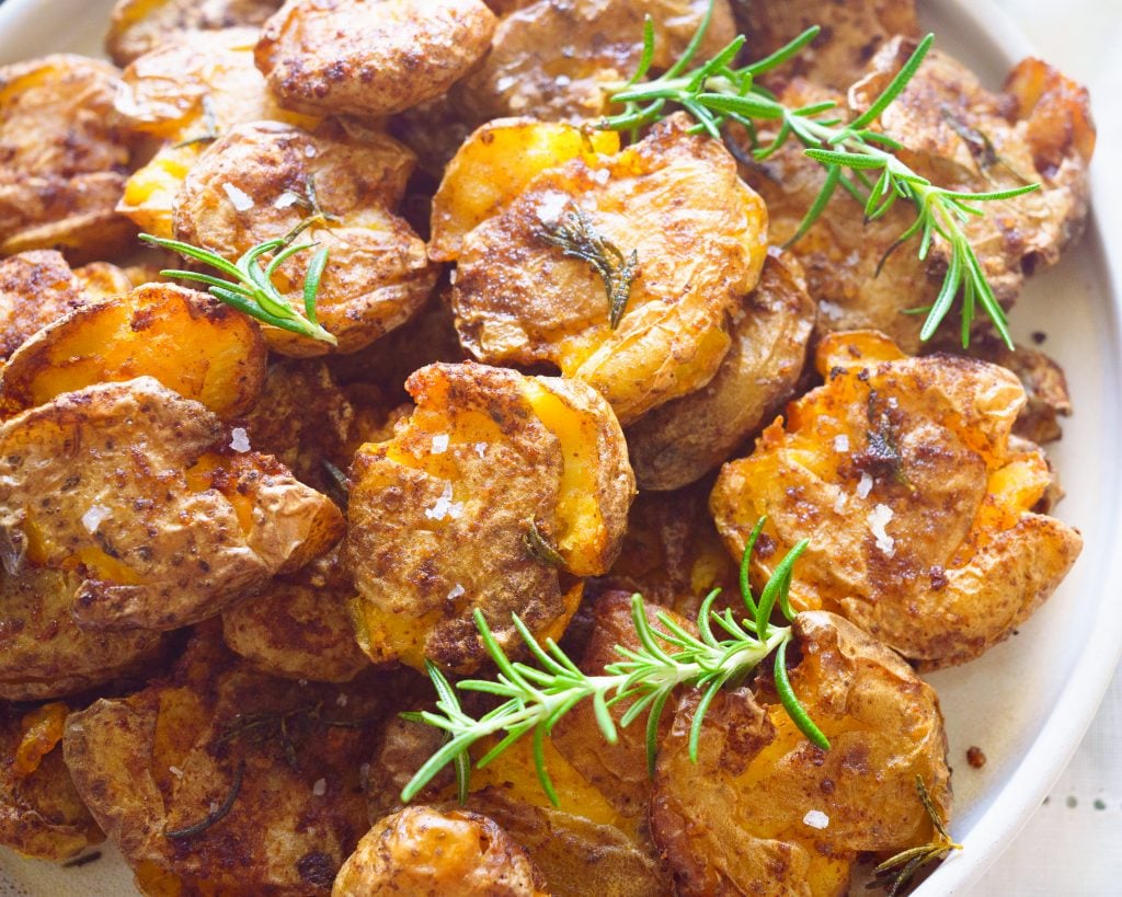 Rosemary & Garlic Crispy Smashed Potatoes made in the air fryer or Oven. This dish is such a great thanksgiving side!